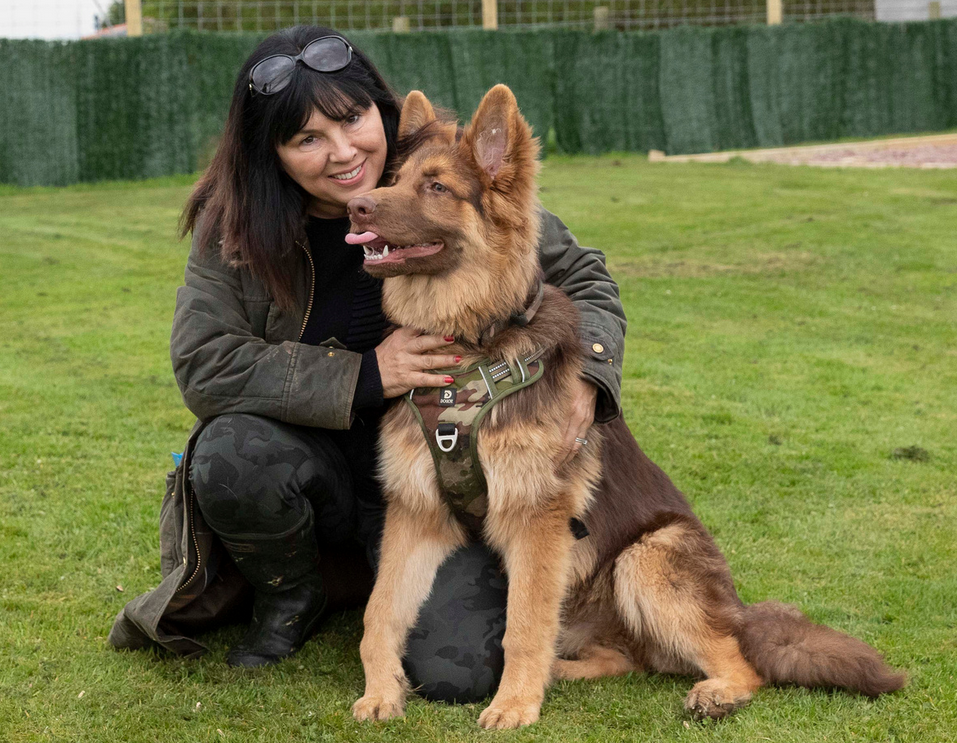 Susan with her dog Luther. Welcome to Openhearth Unleashed
